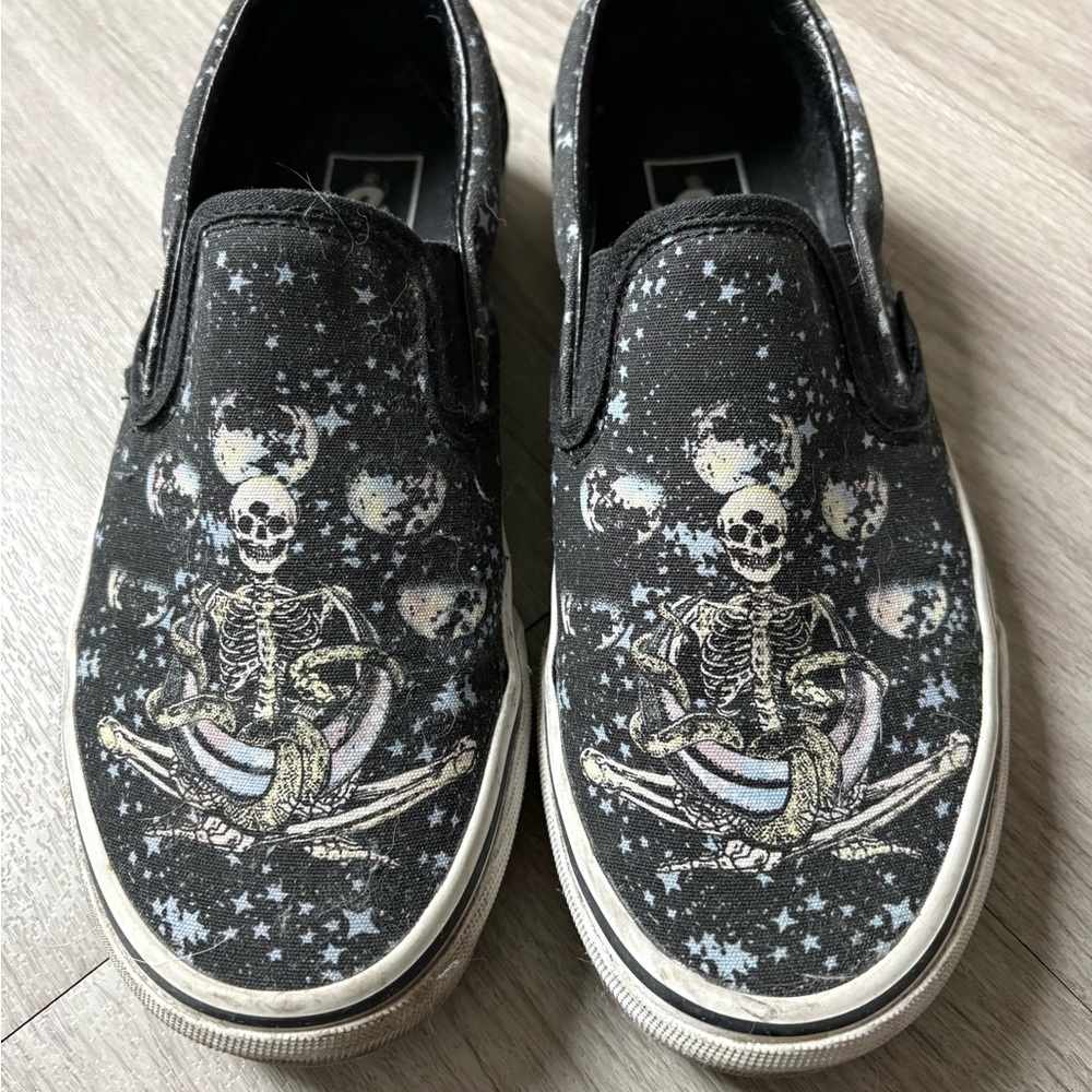Vans Women’s Starry Skeleton Slip-On Sneakers - Black